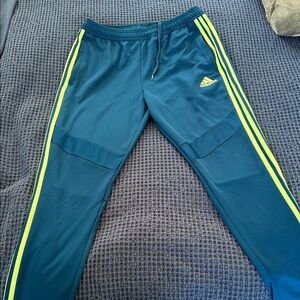 Adidas Men's Teal Joggers with Neon Yellow Stripes Tiro
